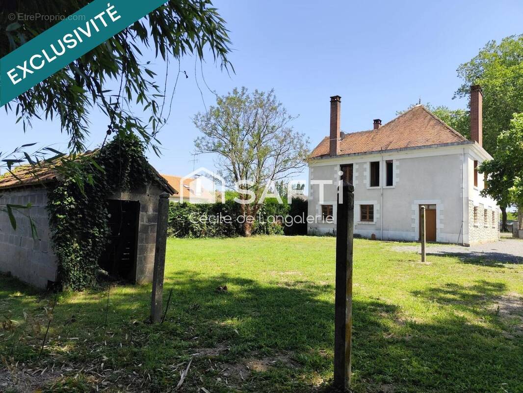 Photo 1 - Maison à LA TRIMOUILLE