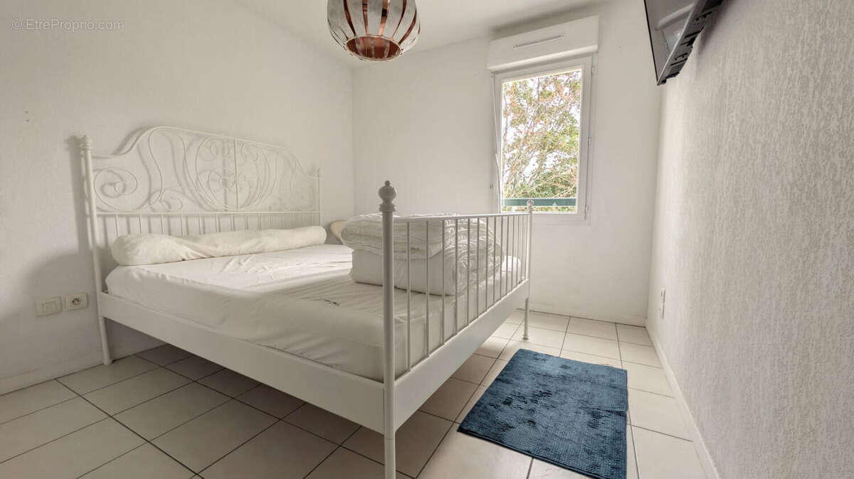 Joli appartement T3  de 64,62 m² avec loggia, terrasse, cave et parking - photo 7