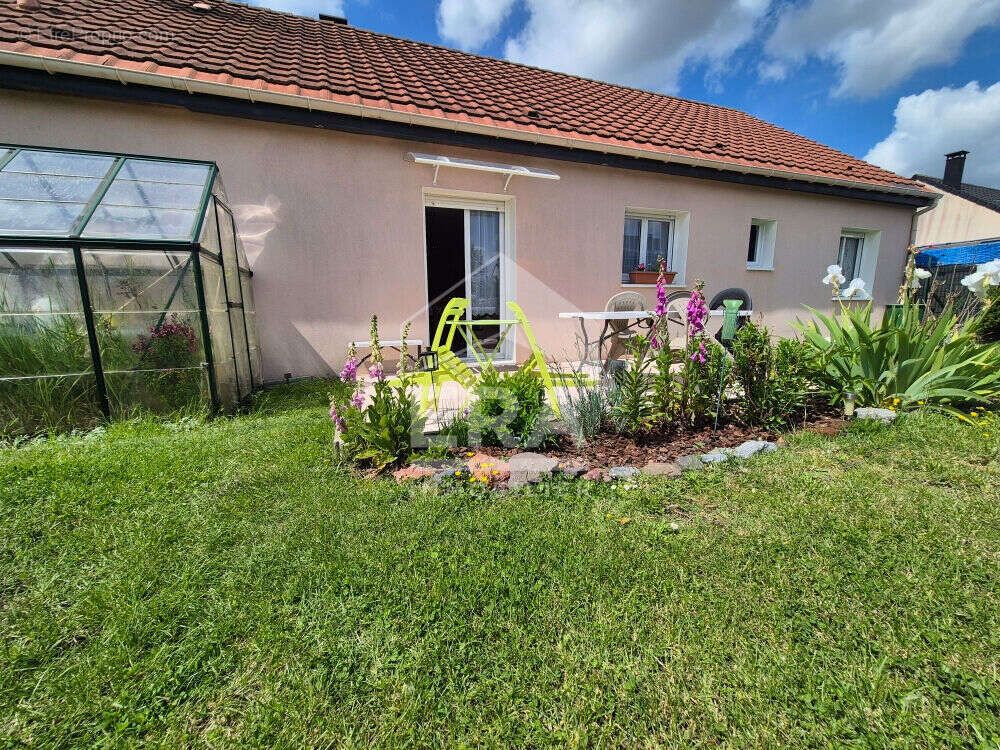 Maison à OSTRICOURT