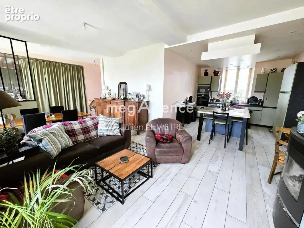 Maison de 7 pièces de 200m² - photo 2