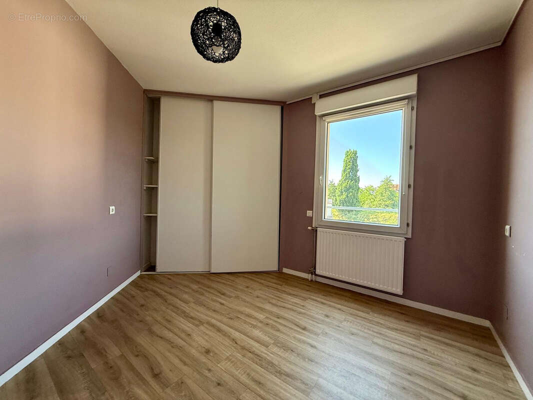 Appartement T3 PMR d’exception en plein cœur de Roanne   Confort, accessibilité et garage - photo 4