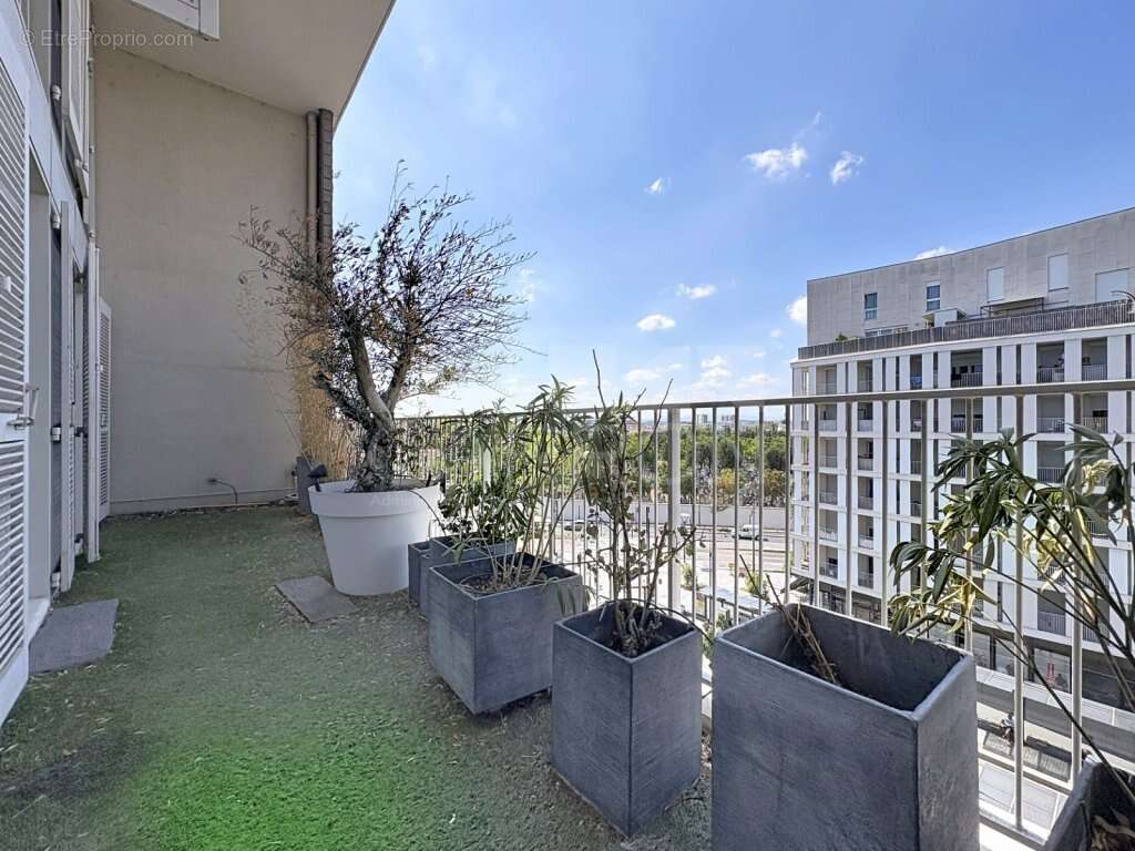 Lyon 8 proche parc blandan t4 duplex dernier etage terrasse 18m² 419000€ - photo 4