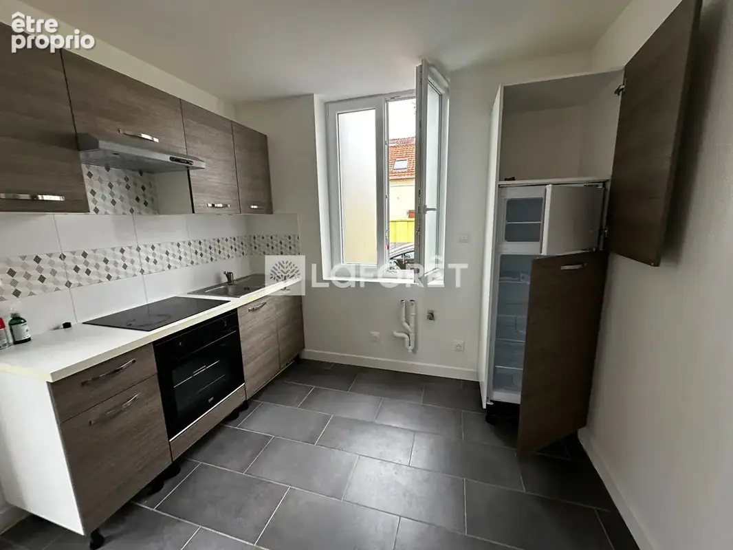 Coquette maison de ville entièrement rénovée avec jolie cour - photo 3