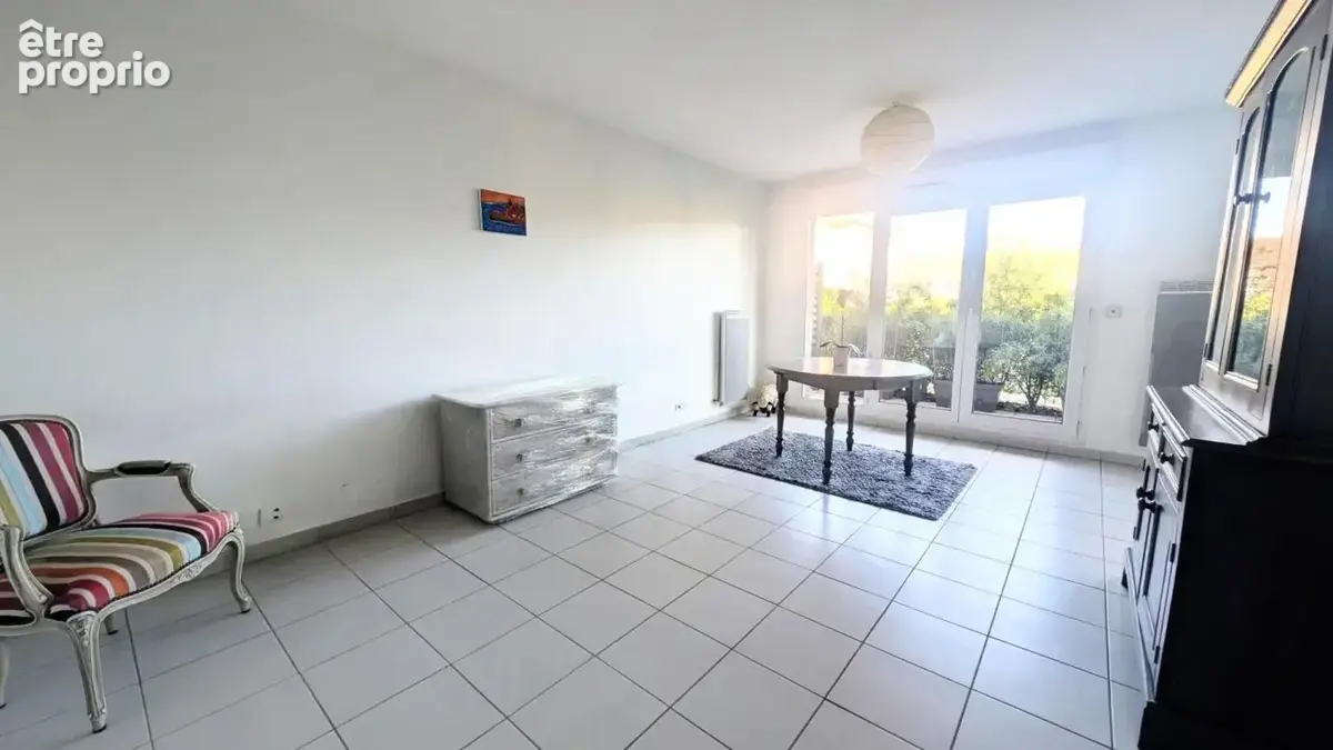 Appartement lumineux en rez-de-jardin avec place de parking - photo 4