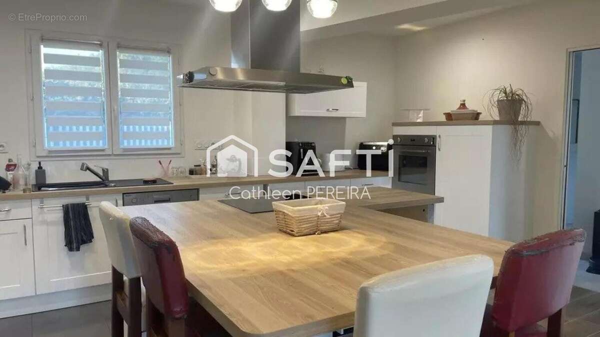 Photo 2 - Maison à SAINT-SULPICE