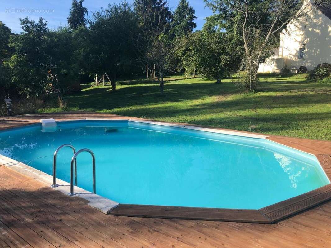 Photo 2 - Maison à SAINT-JEAN-LA-POTERIE