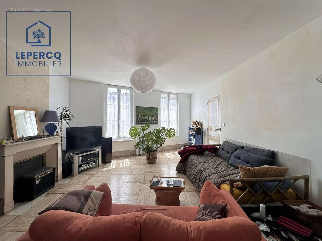 maison 5 pièces 107m² centre-ville - photo 2
