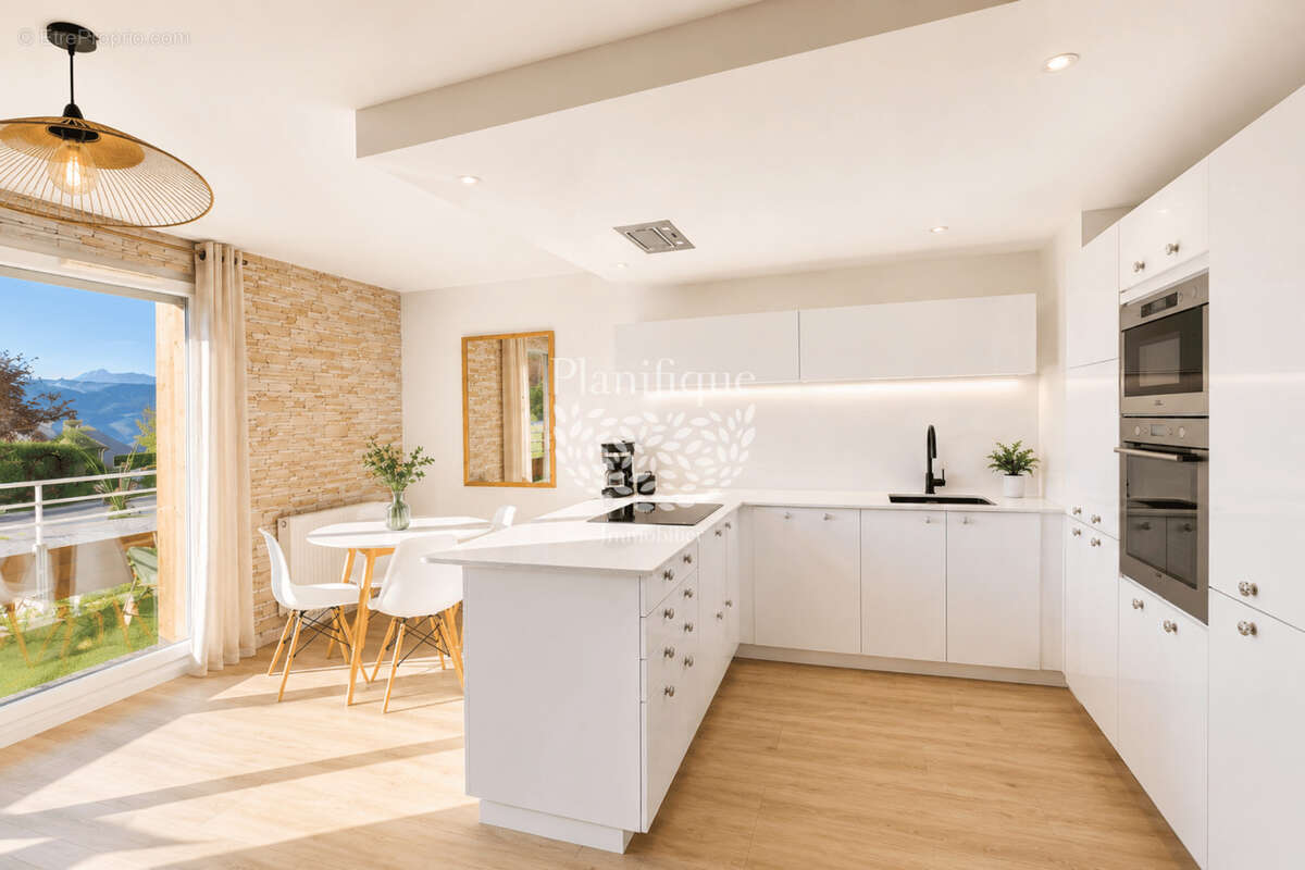 Duplex rénové en dernier étage avec terrasse et garage double à Bonne - photo 4