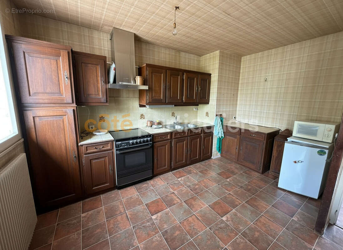 Maison à SAINT-SEBASTIEN-DE-MORSENT