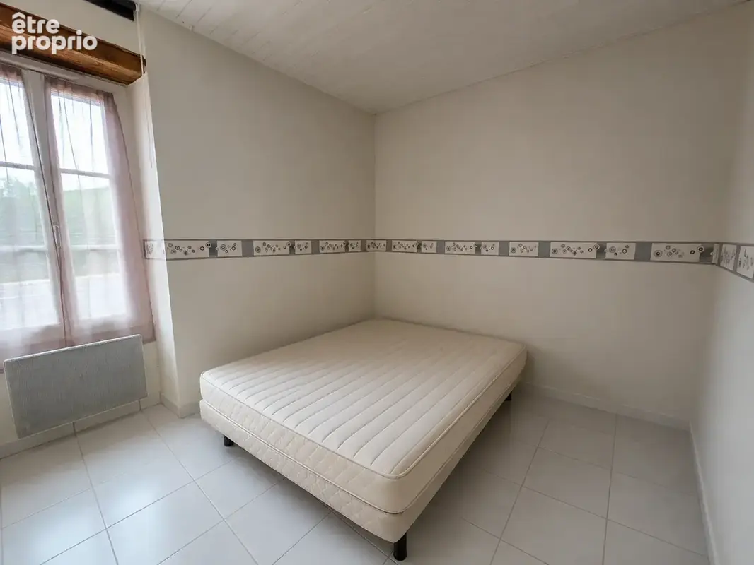 Longère en pierre louée   73,85 m2   terrain 1 078 m2   garage - photo 6