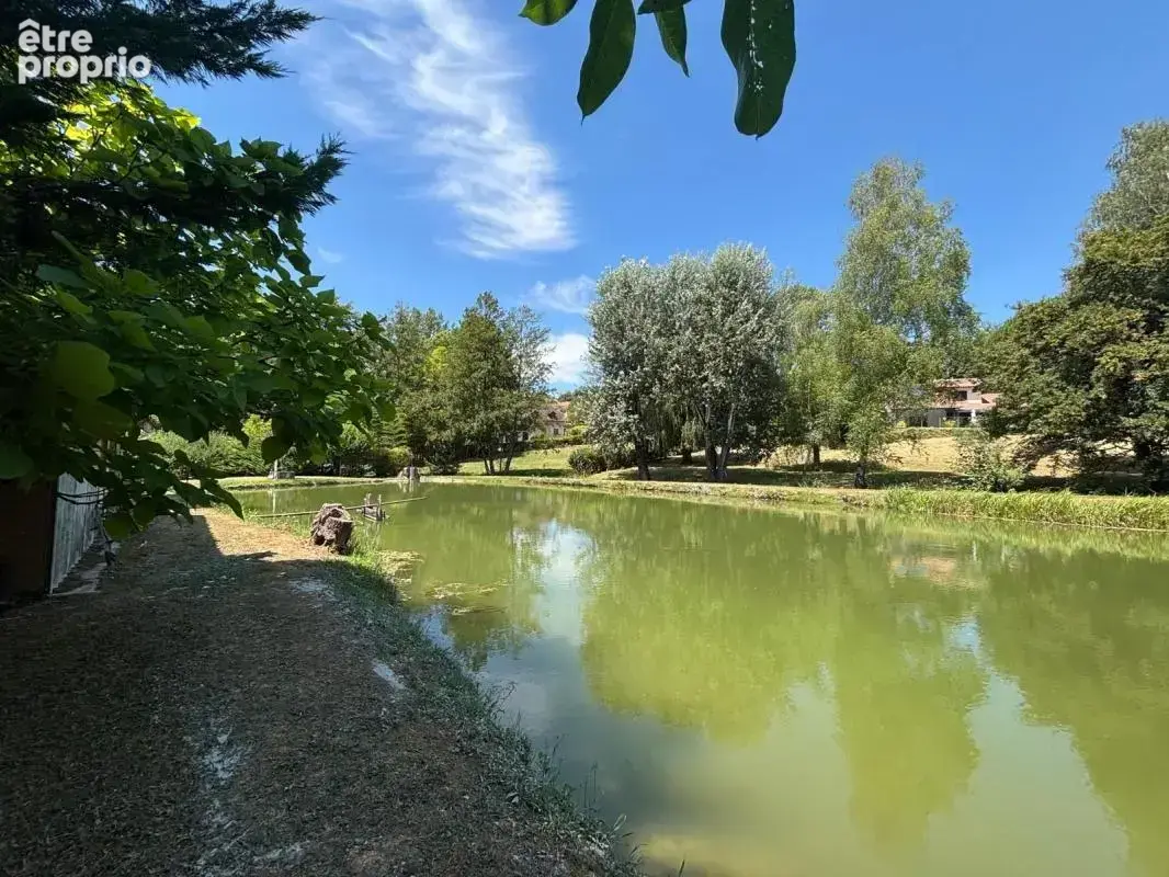 Tènement immobilier avec étang - photo 20