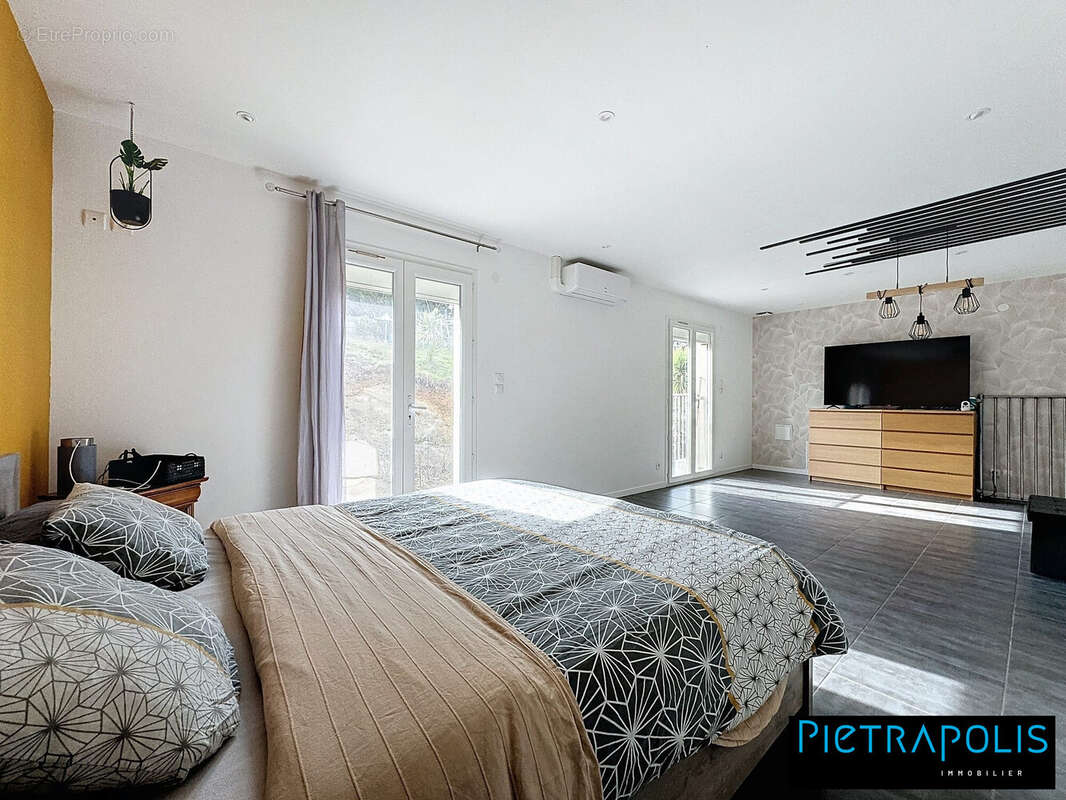 Maison à PONT-EVEQUE