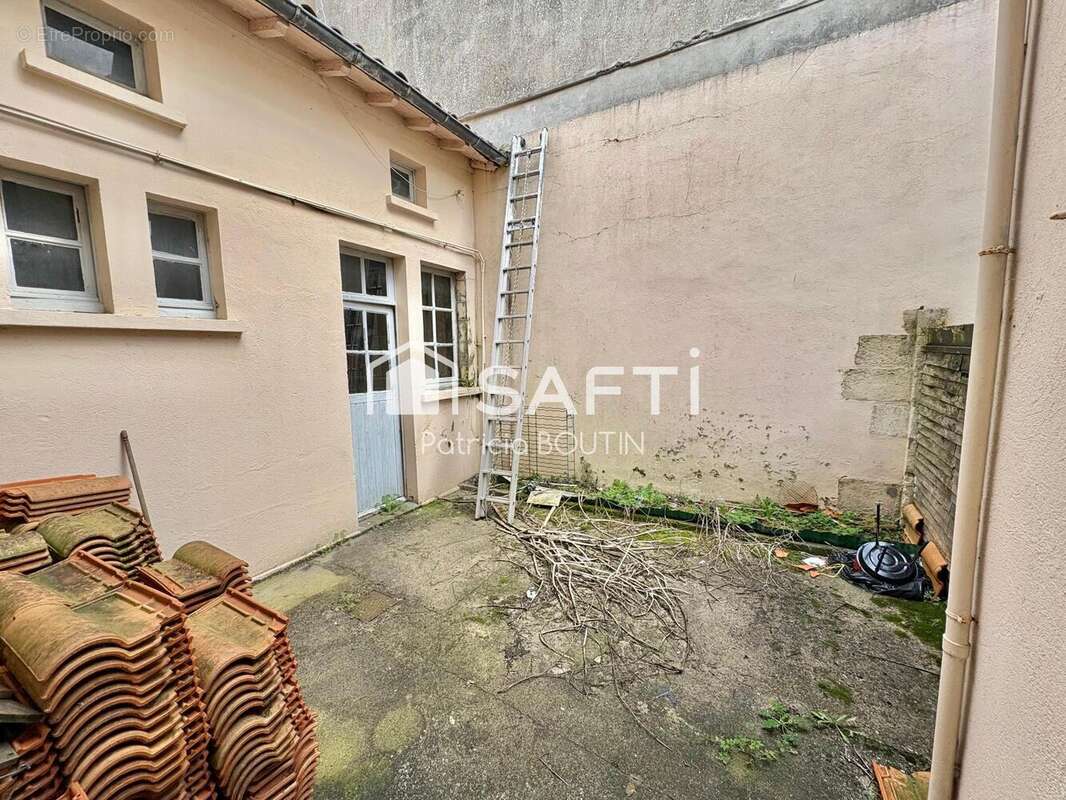 Photo 9 - Commerce à NIORT