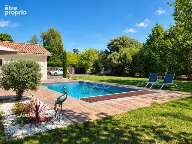 Maison récente de 146 m² avec piscine sur terrain arboré de 1 646 m² - photo 6