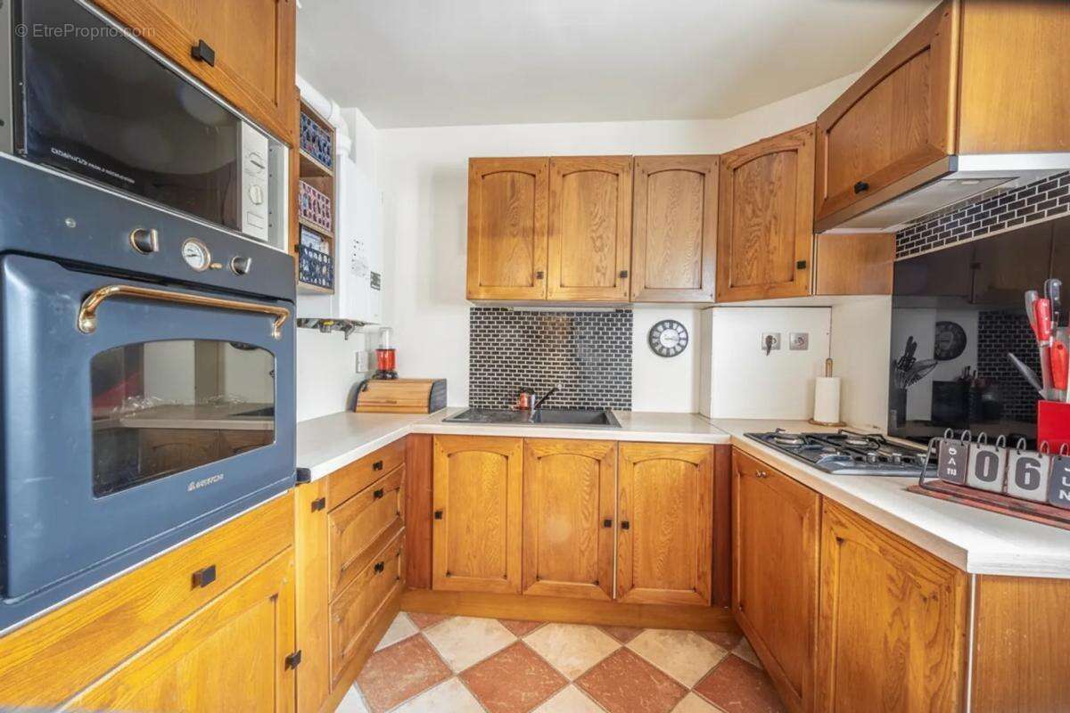 Maison de 5 pièces de 80 m² à Sainte-Geneviève-des-Bois - photo 3