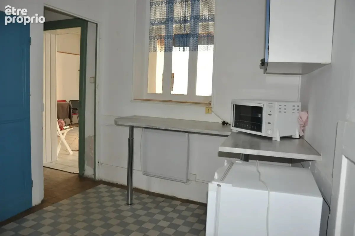 Immeuble de caractère en centre-ville, avec local commercial, duplex et appartement loué - photo 10