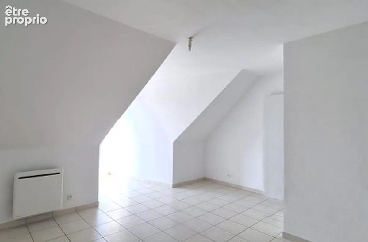Appartement T1 à vendre à Lisieux de 35m² au sol avec balcon et stationnement - Dernier étage, exposition sud - photo 3