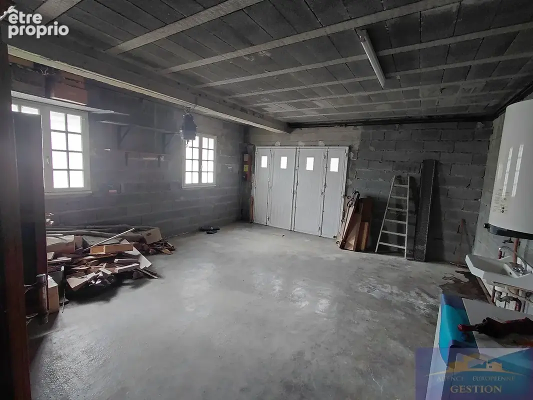Maison élevée sur deux niveaux avec terrain et garage - photo 19