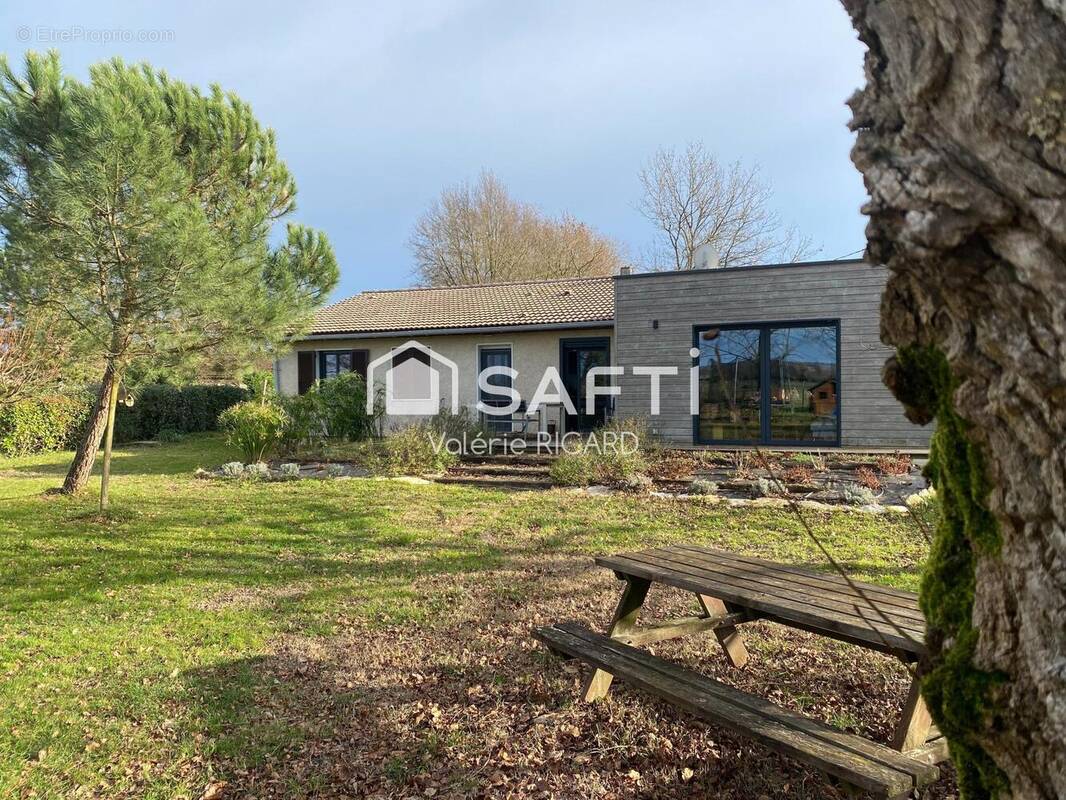 Photo 1 - Maison à SAINT-ETIENNE-DE-TULMONT