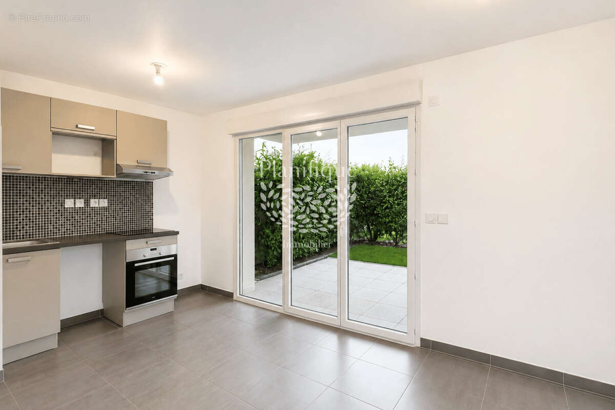T2 rez de jardin a Cranves Sales - photo 3