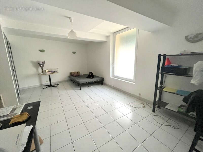 Immeuble 250m2 : un commerce + 2 appartements - photo 9
