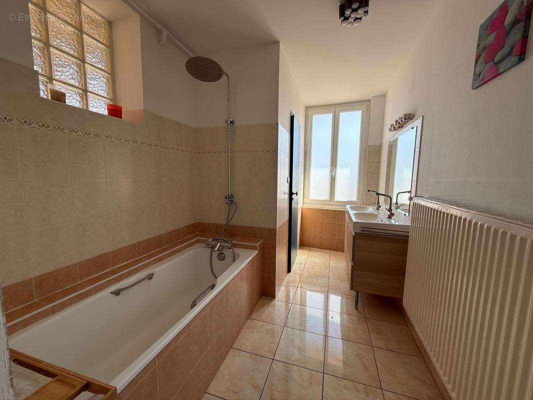A VENDRE EN EXCLUSIVITÉ à Rumilly (74150) – Centre-ville – Appartement traversant de 120 m² avec annexes - photo 6