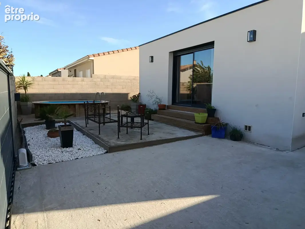 Maison de plain-pied T4 de 96 M2 sur 326 M2 de terrain - photo 7