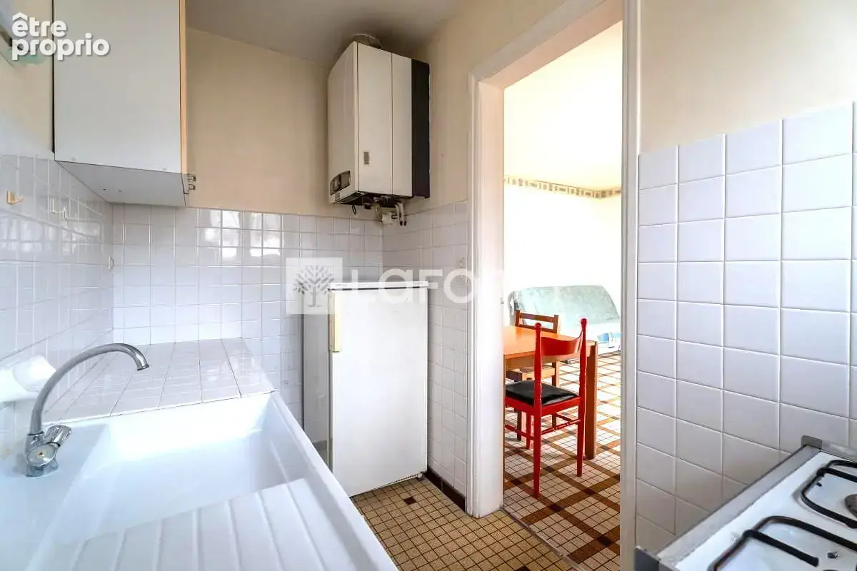 Maison de 150m² divisée en 4 T2 - photo 3