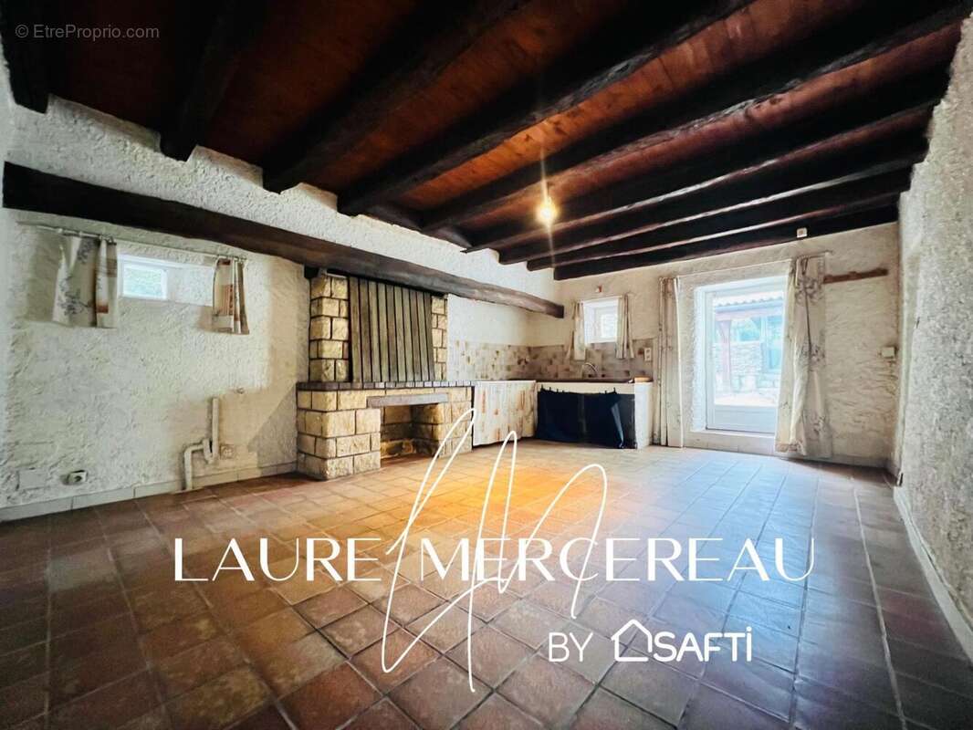 Photo 2 - Maison à SAINT-ETIENNE-DU-BOIS