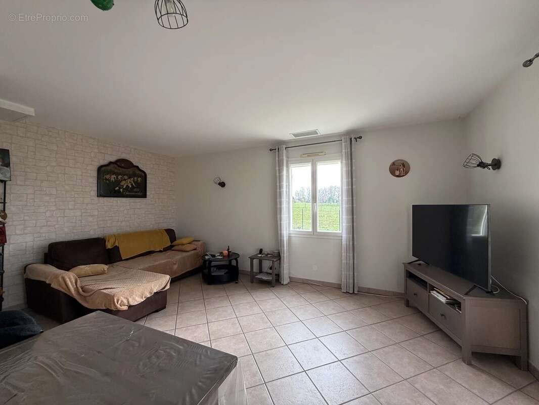 Maison à SAINT-AUBIN-DE-LANQUAIS