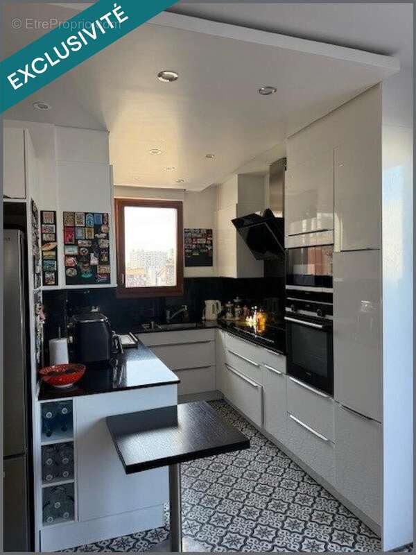 Photo 8 - Appartement à GENNEVILLIERS