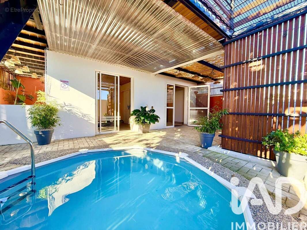 Maison 140 m² à Le Port  - photo 2