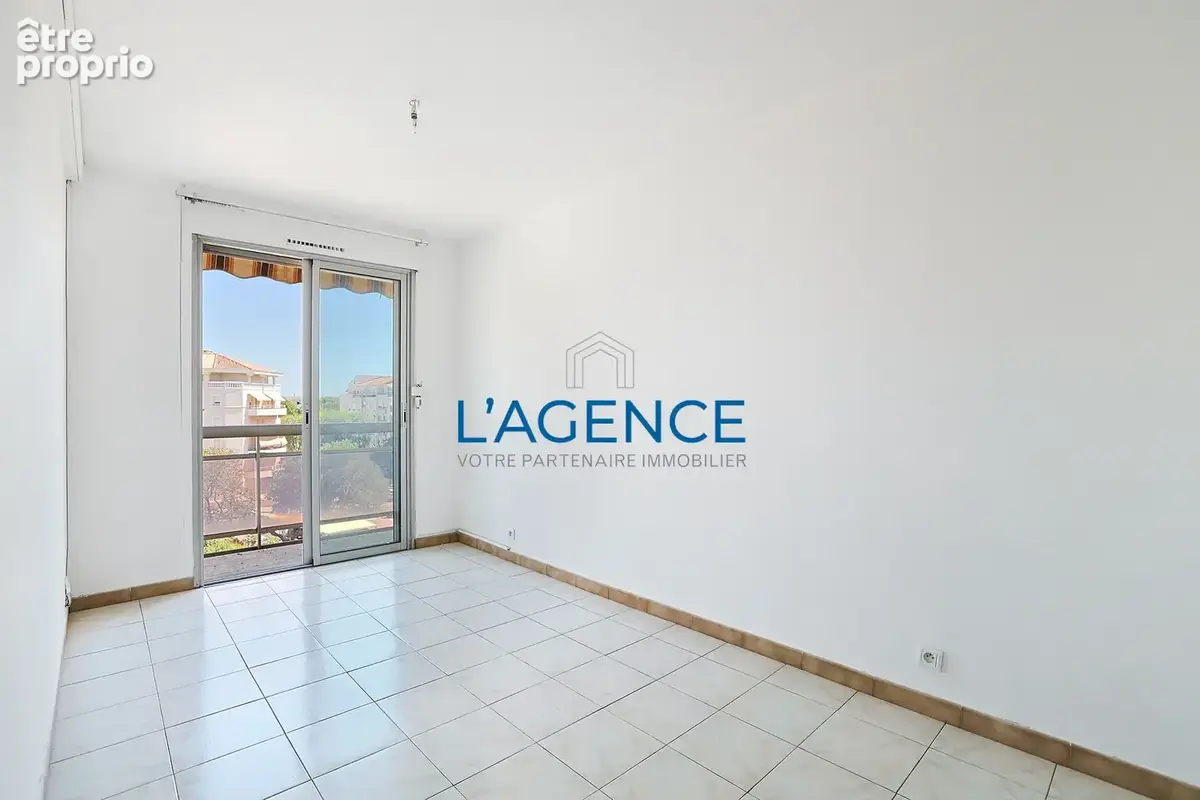 Appartement T4 de 91 m2 en étage avec ascenseur et parking privatif en plein coeur du centre ville - photo 11