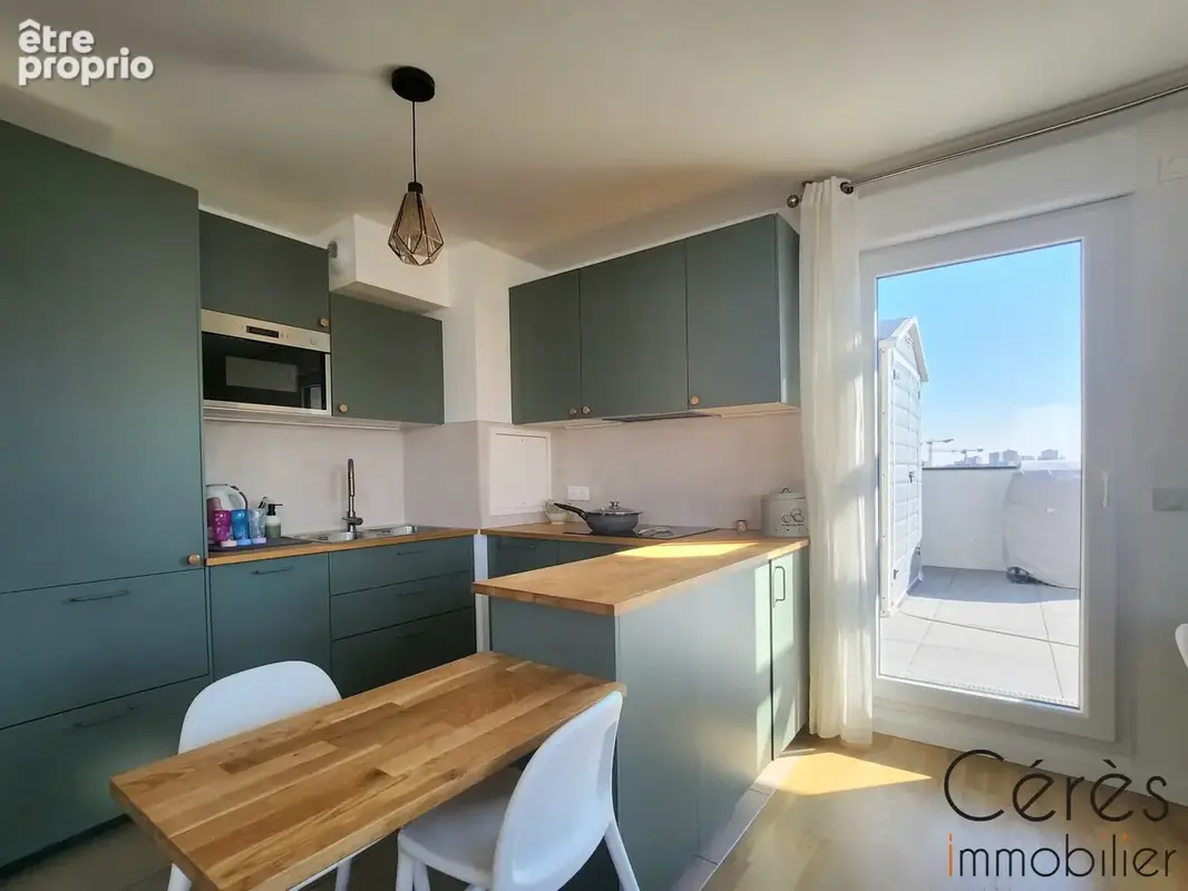 Appartement 4 pièces 90 m² à vendre à Romainville (93230) - photo 2