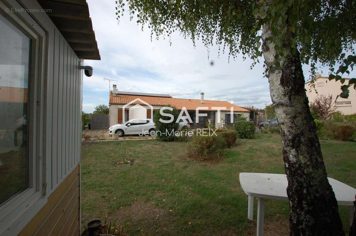 Photo 3 - Maison à SAINT-GERMAIN-DE-LUSIGNAN