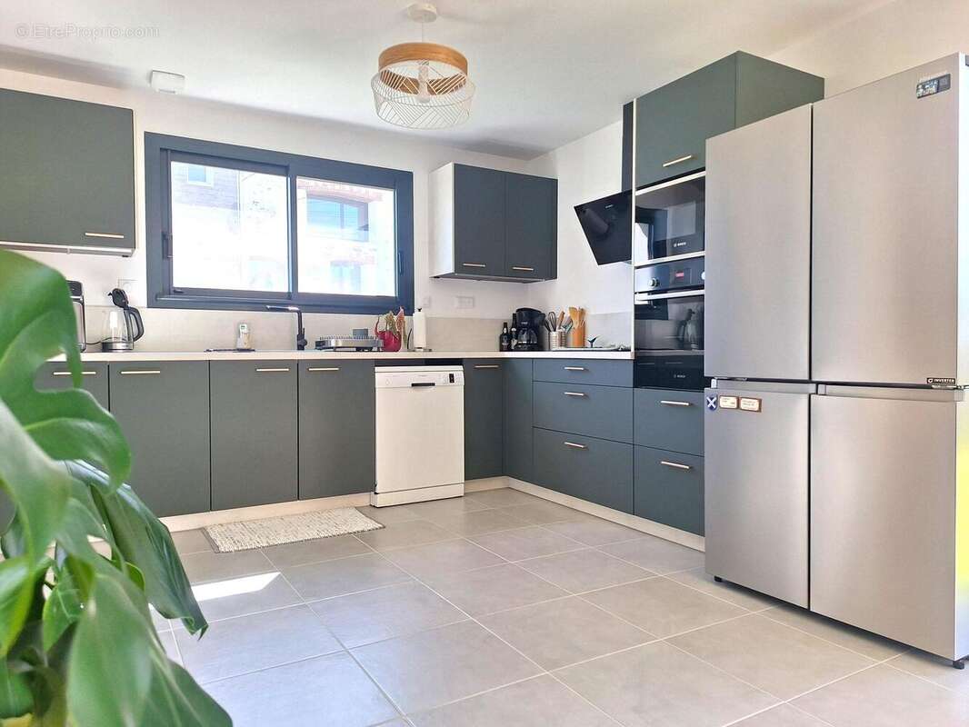 Maison 89 m² à Le Fuilet  - photo 3