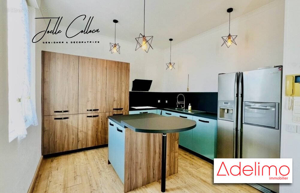 Cuisine aménagée et équipée - Appartement à AIGUES-MORTES