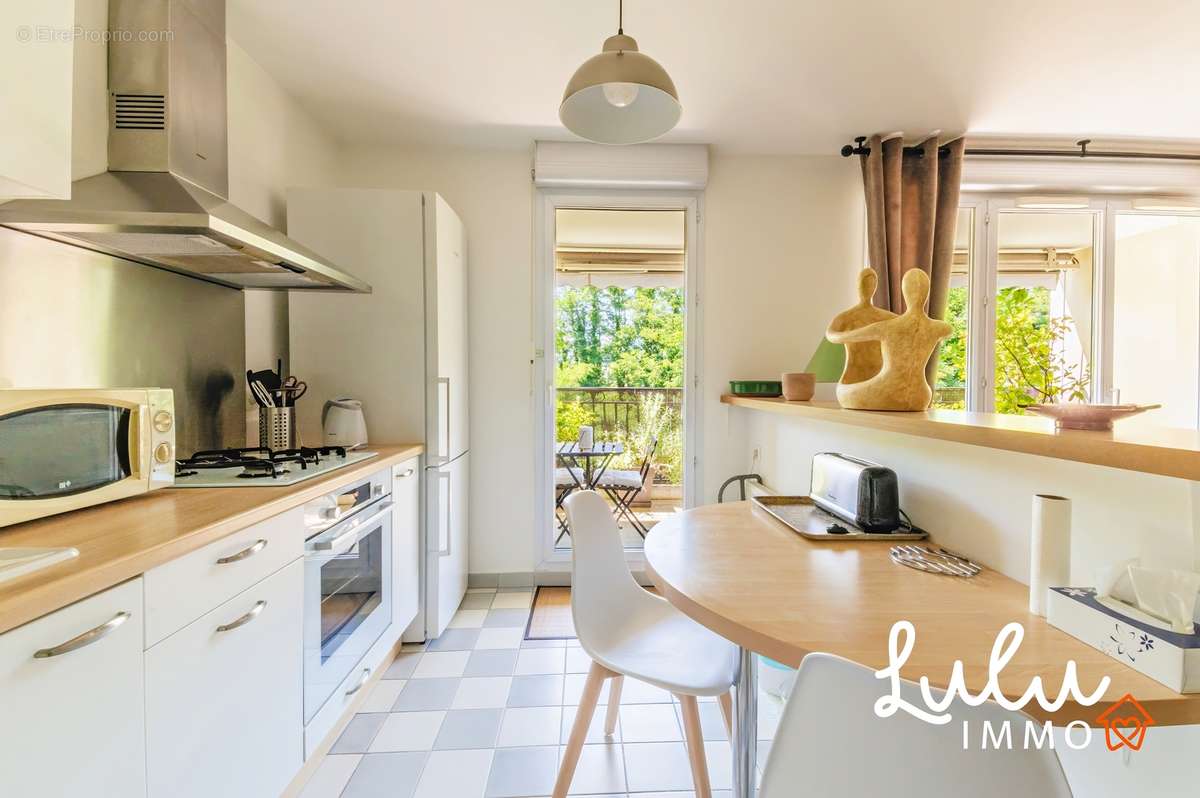 Appartement T3 de 75m2 avec terrasse au calme et box fermé - photo 7