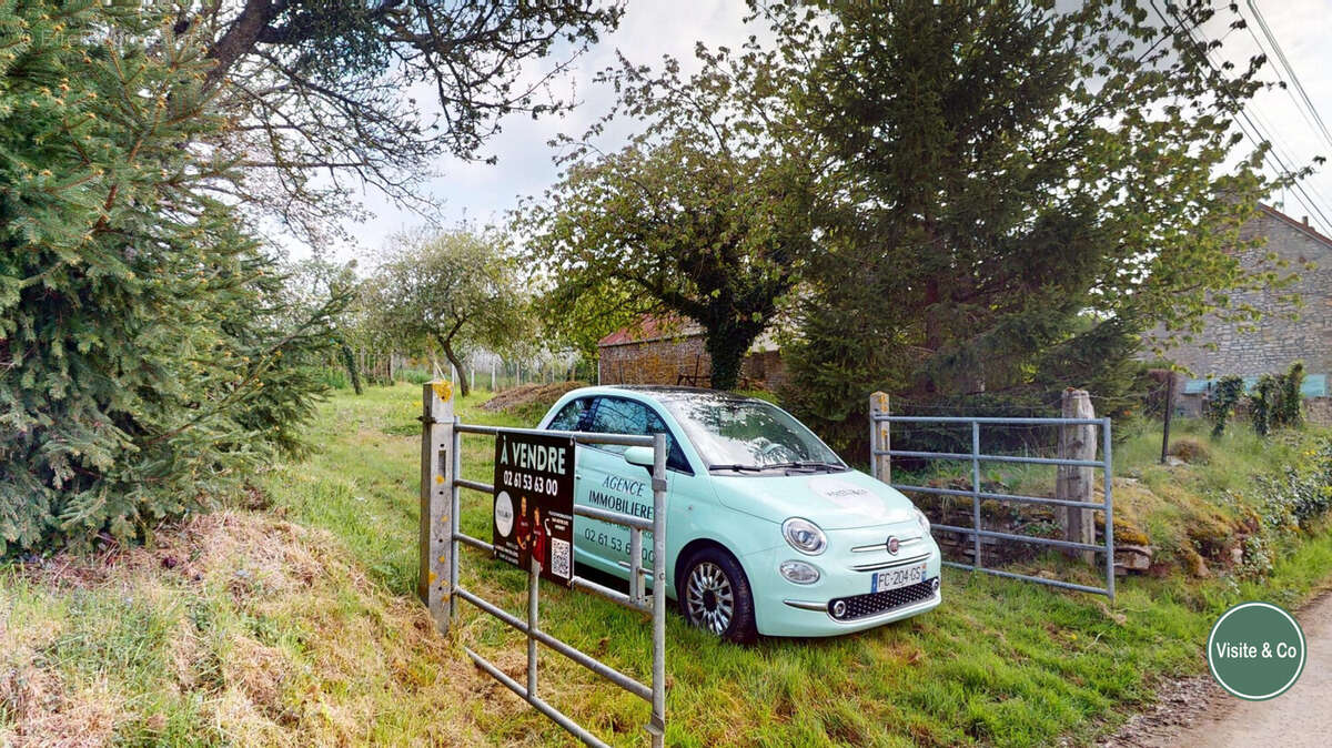 Terrain à OUILLY-LE-TESSON
