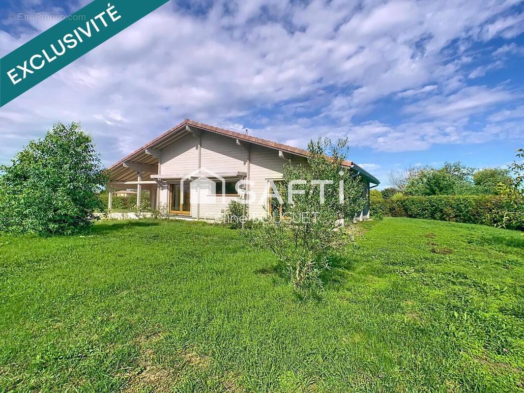 Photo 1 - Maison à MONTBETON