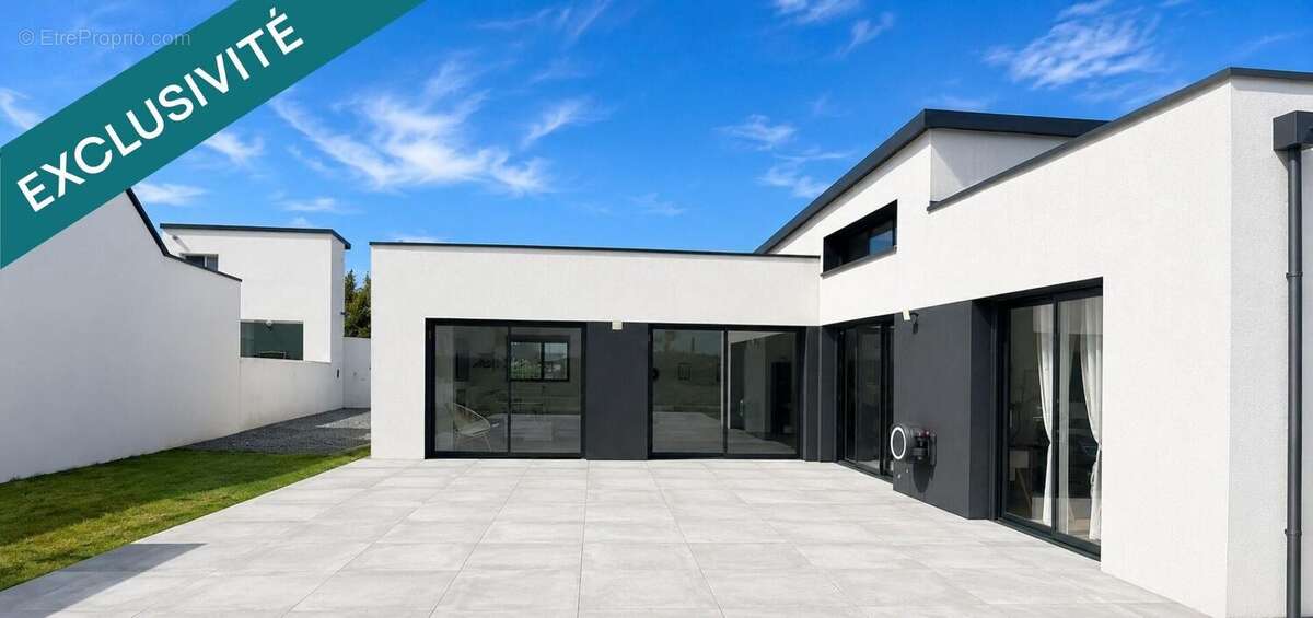 Photo 2 - Maison à LANDIVISIAU