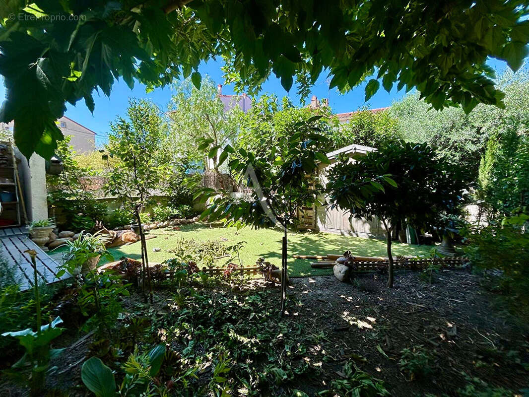 Charmante maison de ville  T5 125m2 jardin et garage - photo 15