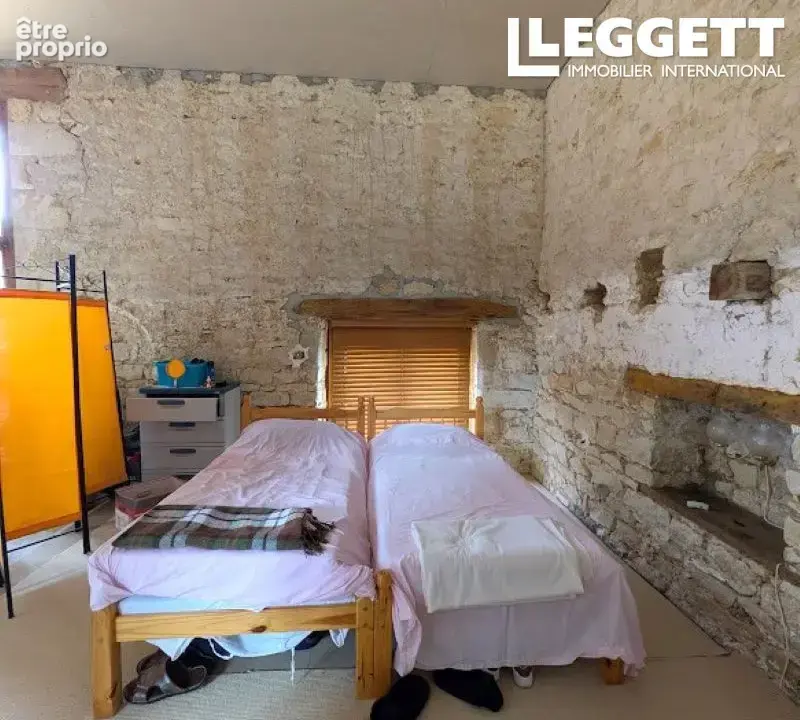 Maison en pierre de 70 m² avec combles aménageables – beau potentiel - photo 7