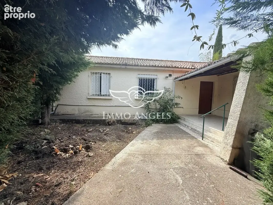 Maison 4 pièces 92 m² à vendre à Nimes (30900) - photo 2