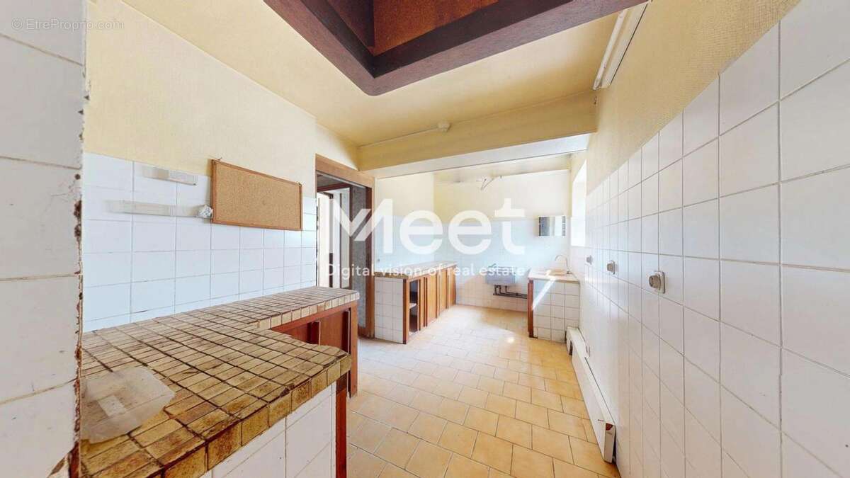 Local commercial - 7 chambres - photo 10