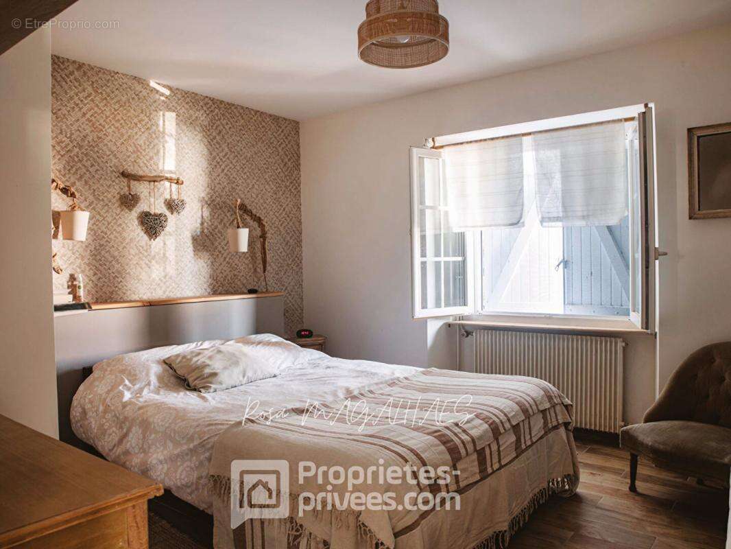 Une propriété aux multiples possibilités, alliant confort, charme et potentiel - photo 4