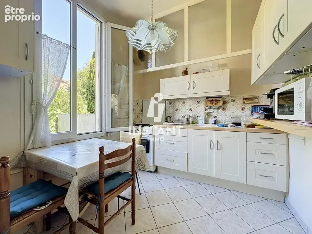 Maison de plain-pied avec jardin et sous-sol - Quartier des Fl - photo 6