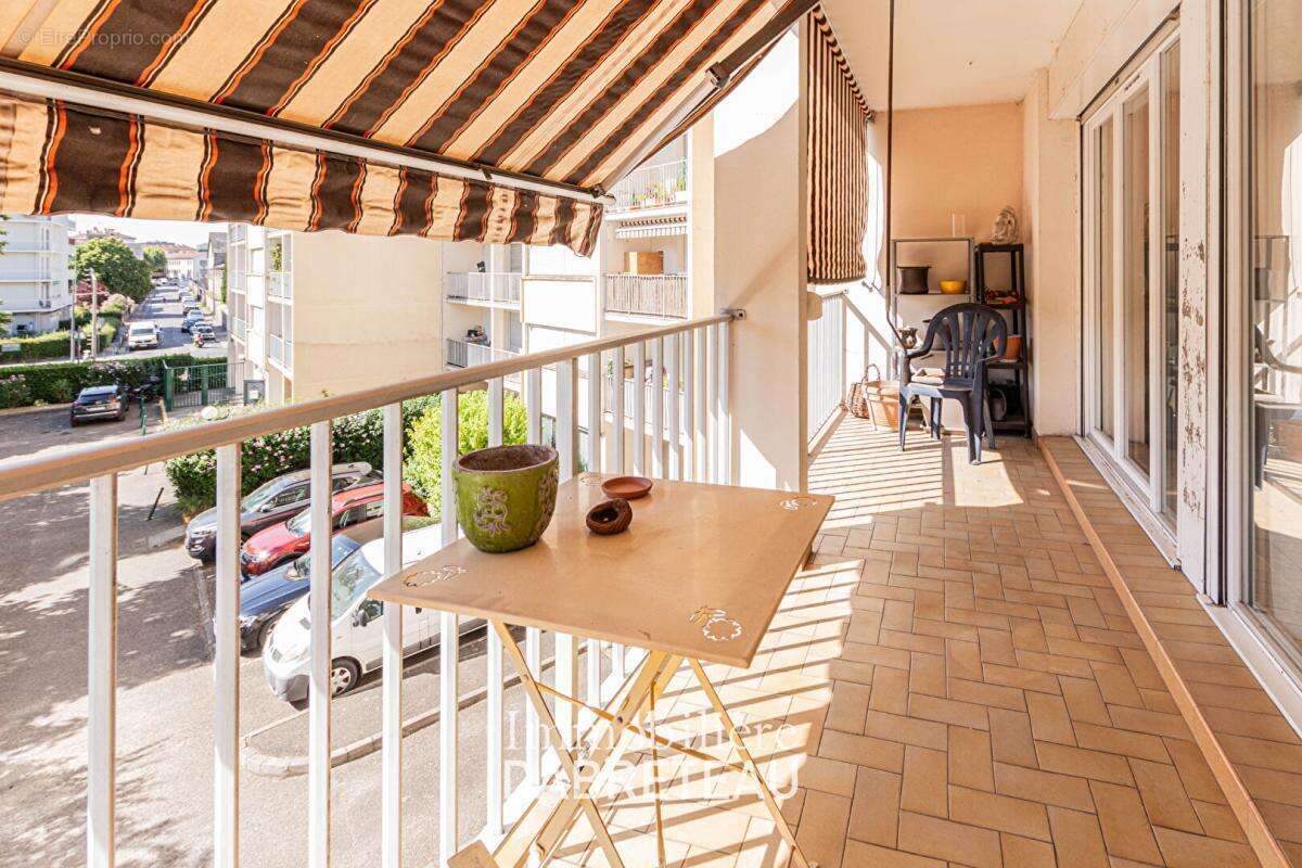 Rue du Luizet - T3 traversant avec balcon, stationnement et cave - photo 13
