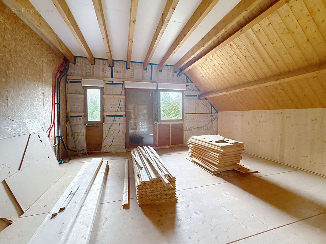 Grande maison à ossature et bardage bois - photo 9