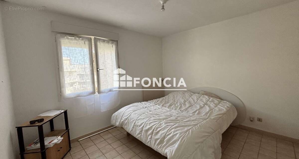 Béziers – T3 de 60 m² avec balcon et garage, vendu loué avec rendement de 6,7 % - photo 4